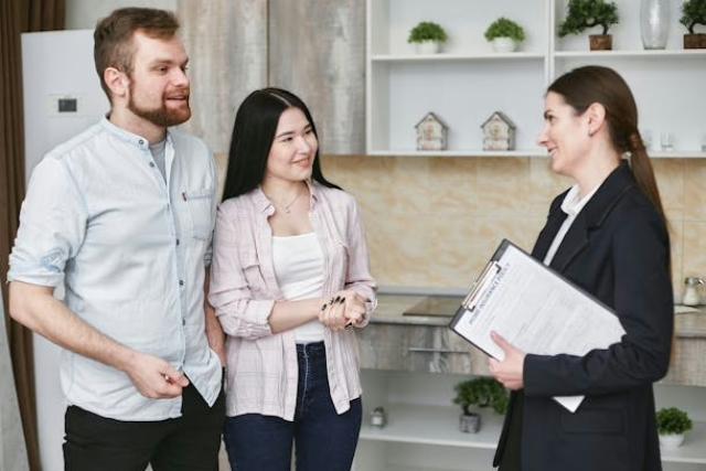 Agent meeting with prospective tenants
